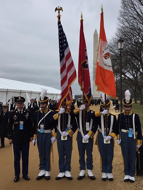 Signal Mountain High School Class of 2013 graduate Ian Dingle, third from left, prepares to march in the inauguration parade of President Donald Trump.