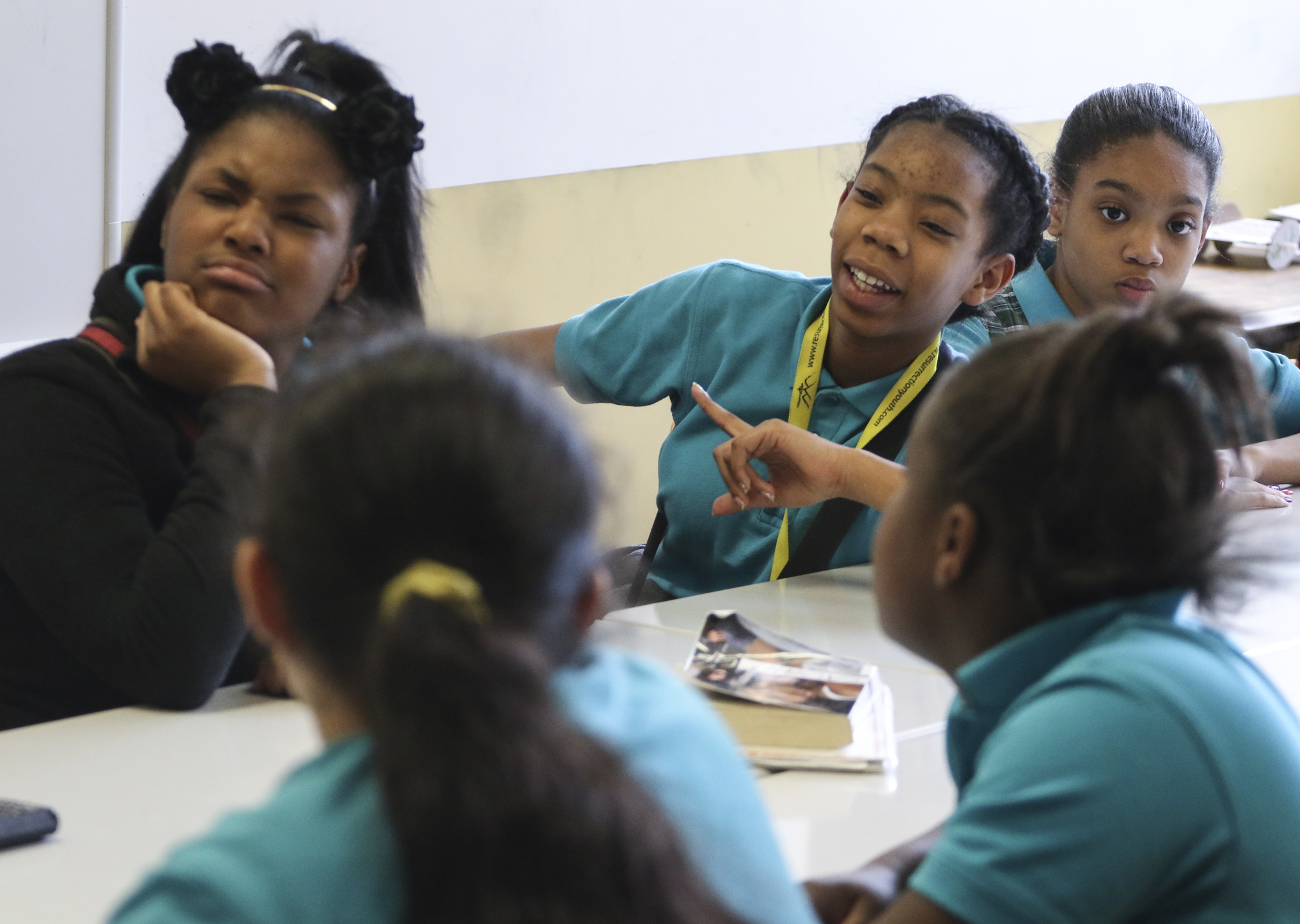 Staff Photo by Dan Henry / The Chattanooga Times Free Press- 2/20/17. Aniya Harvey, middle right, and other Chattanooga Girls Leadership Academy 7th grade students discuss the movie Hidden Figures in J.J. Roberson's class on February 20, 2017 that they attended instead of being off for Presidentճ day like the rest of the county.