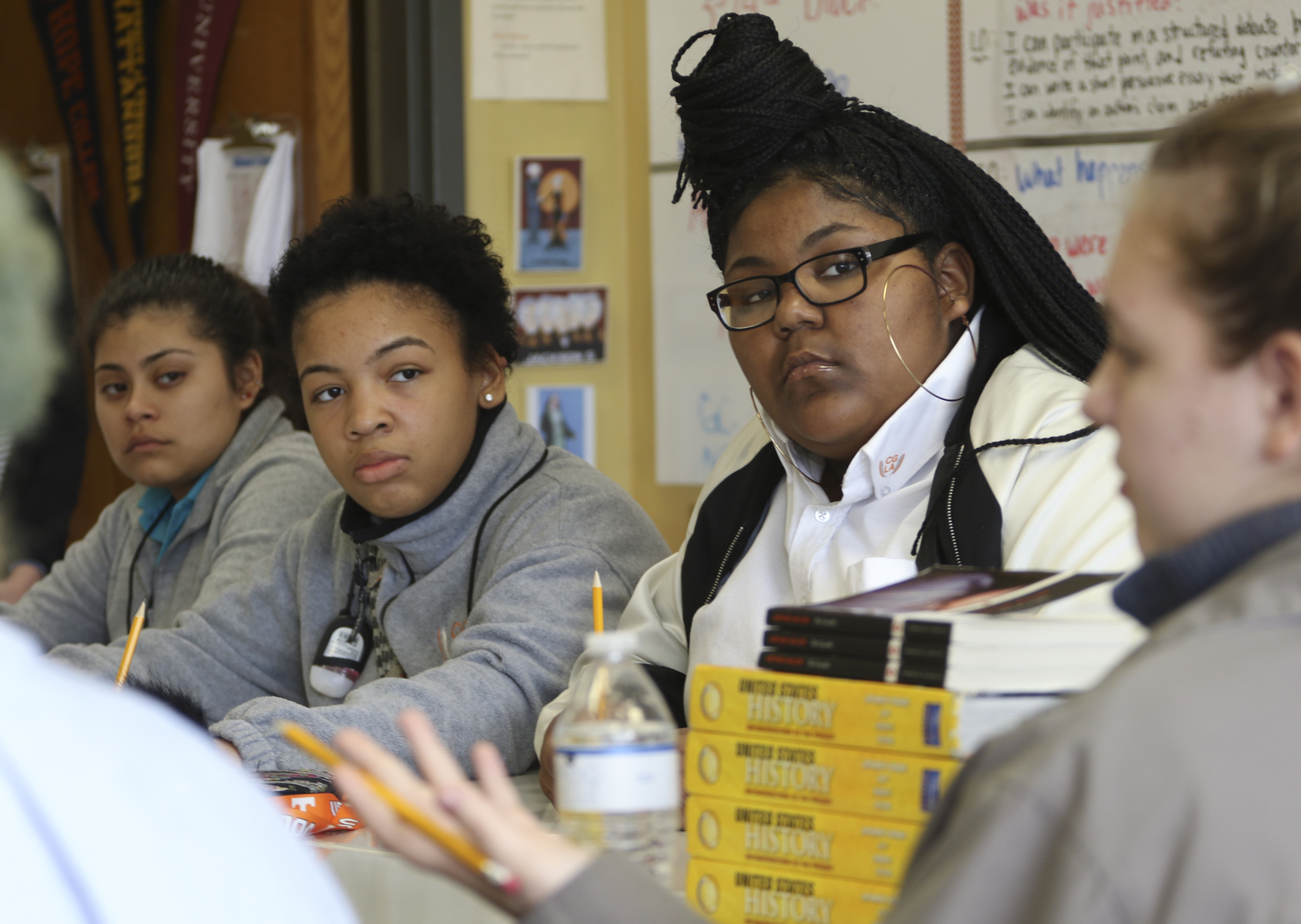Aareon Reed, from left, discuss the movie Hidden Figures on February 20, 2017 with other Chattanooga Girls Leadership Academy students. CGLA attended a movie Monday instead of being off for Presidentճ day like the rest of the county.