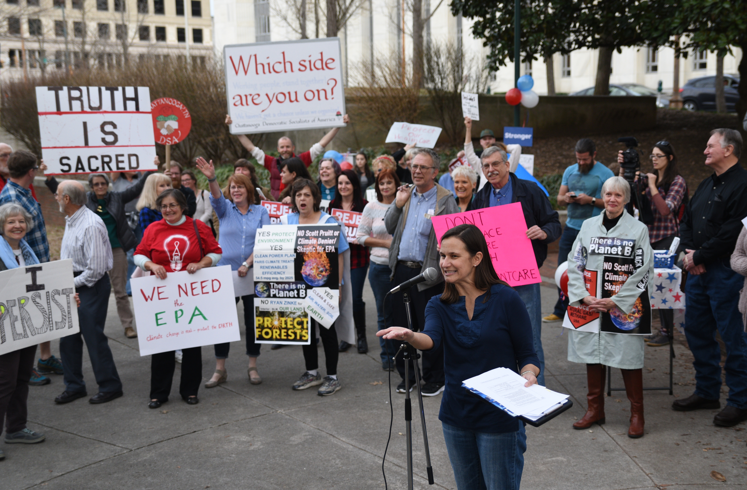 Kelley Sullins Elliott speaks during a Welcome Home for Recess Rally across from the Joel Solomon Federal Building Monday Feb. 20, 2017 in Miller Park. Recess Coalition for Chattanooga is calling for politicians to meet with their constituents.