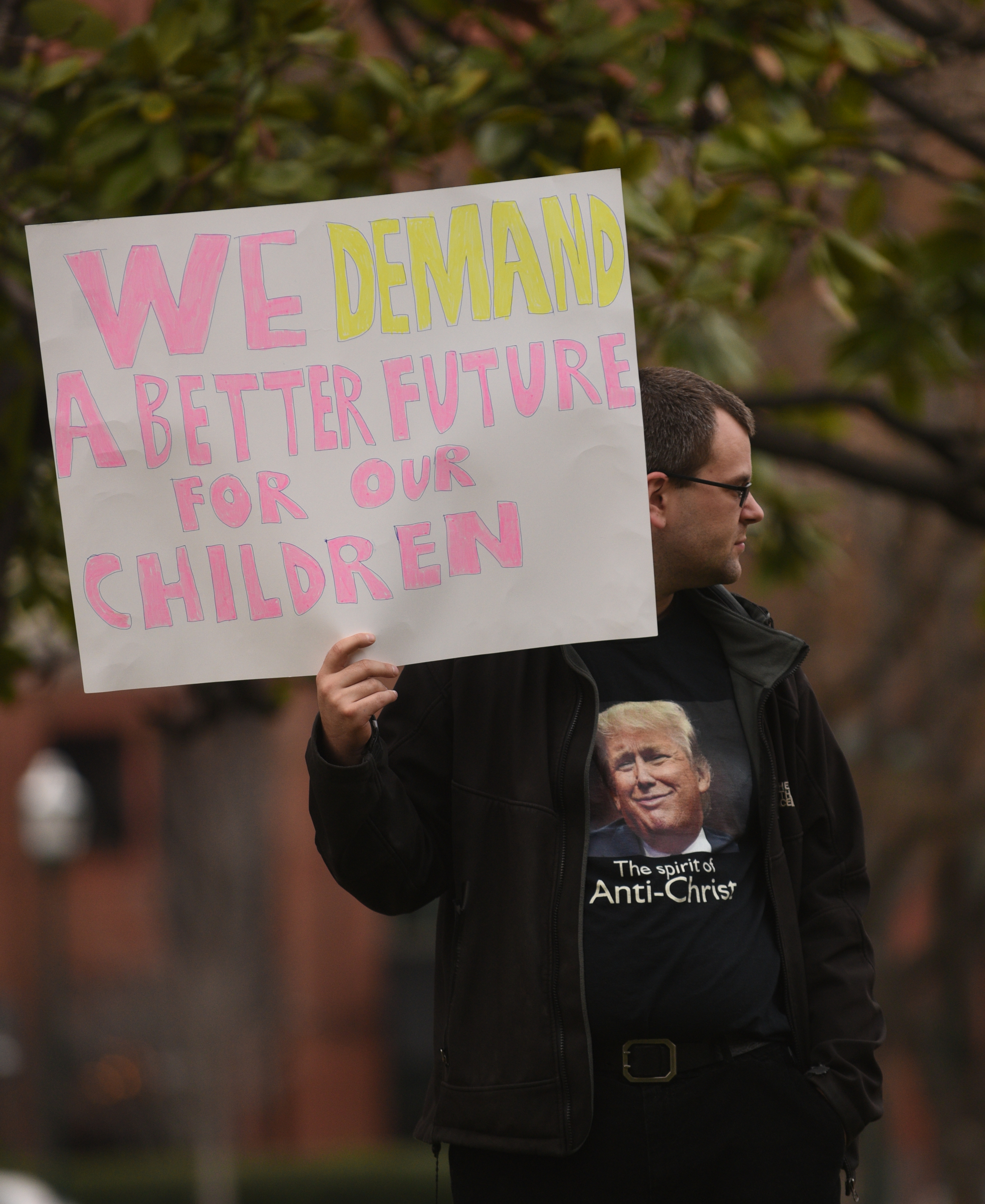 Paul Ainsworth holds a sign during a Welcome Home for Recess Rally across from the Joel Solomon Federal Building Monday Feb. 20, 2017 in Miller Park. Recess Coalition for Chattanooga is calling for politicians to meet with their constituents.