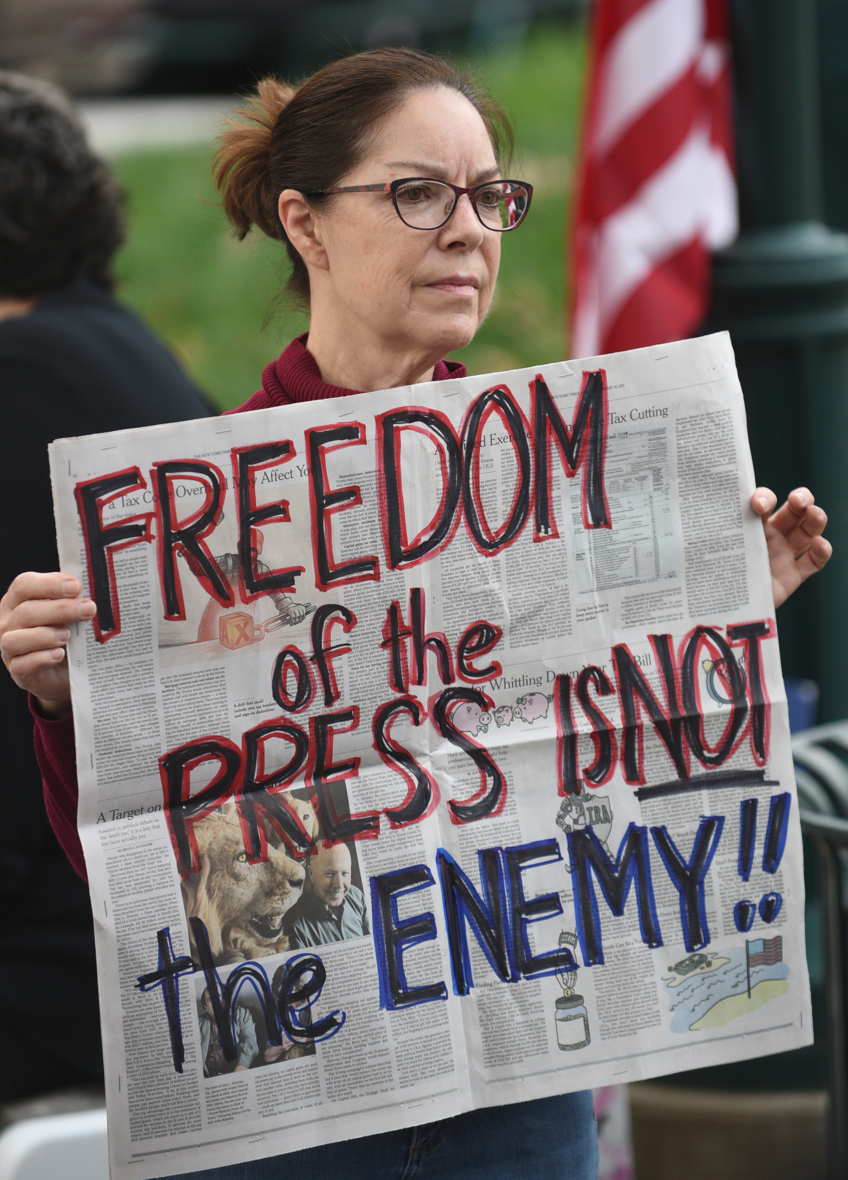 Sharon Alexander holds a sign during a Welcome Home for Recess Rally across from the Joel Solomon Federal Building Monday Feb. 20, 2017 in Miller Park. Recess Coalition for Chattanooga is calling for politicians to meet with their constituents.