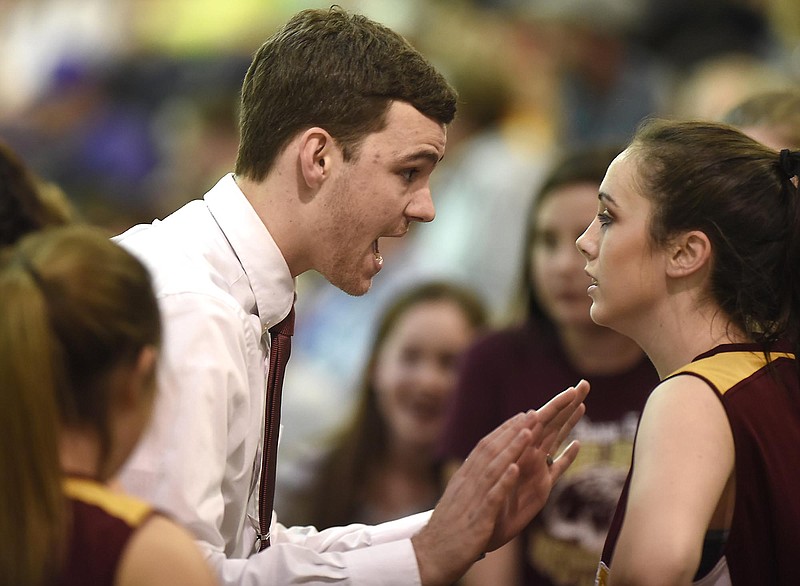 Van Buren County's head coach Tyler Sapp instructs one of his players during a timeout.  The Van Buren County Lady Eagles visited the Marion County Lady Warriors in the of the girls 6-A Championship game on February 20, 2017.