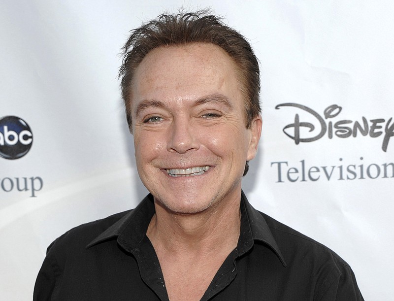 
              FILE - This Aug. 8, 2009 file photo shows actor-singer David Cassidy, best known for his role as Keith Partridge on "The Partridge Family," arrives at the ABC Disney Summer press tour party in Pasadena, Calif. Cassidy says he is struggling with memory loss. Cassidy told People magazine that his family has a history of dementia and that he had sensed “this was coming.” He added that for now he wanted to stay focused and “enjoy life.” (AP Photo/Dan Steinberg, File)
            