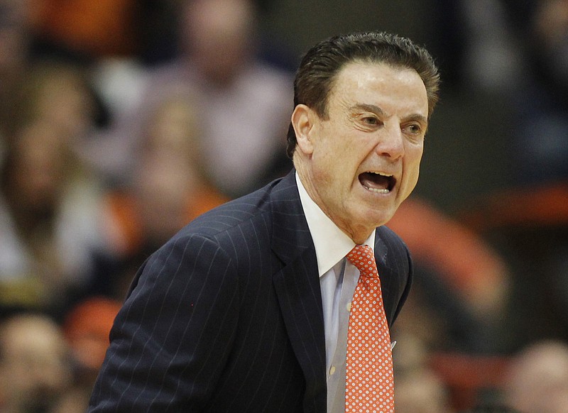 Louisville head coach Rick Pitino yells to his players in the second half of an NCAA college basketball game against Syracuse in Syracuse, N.Y., Monday, Feb. 13, 2017. Louisville won 76-72. (AP Photo/Nick Lisi)