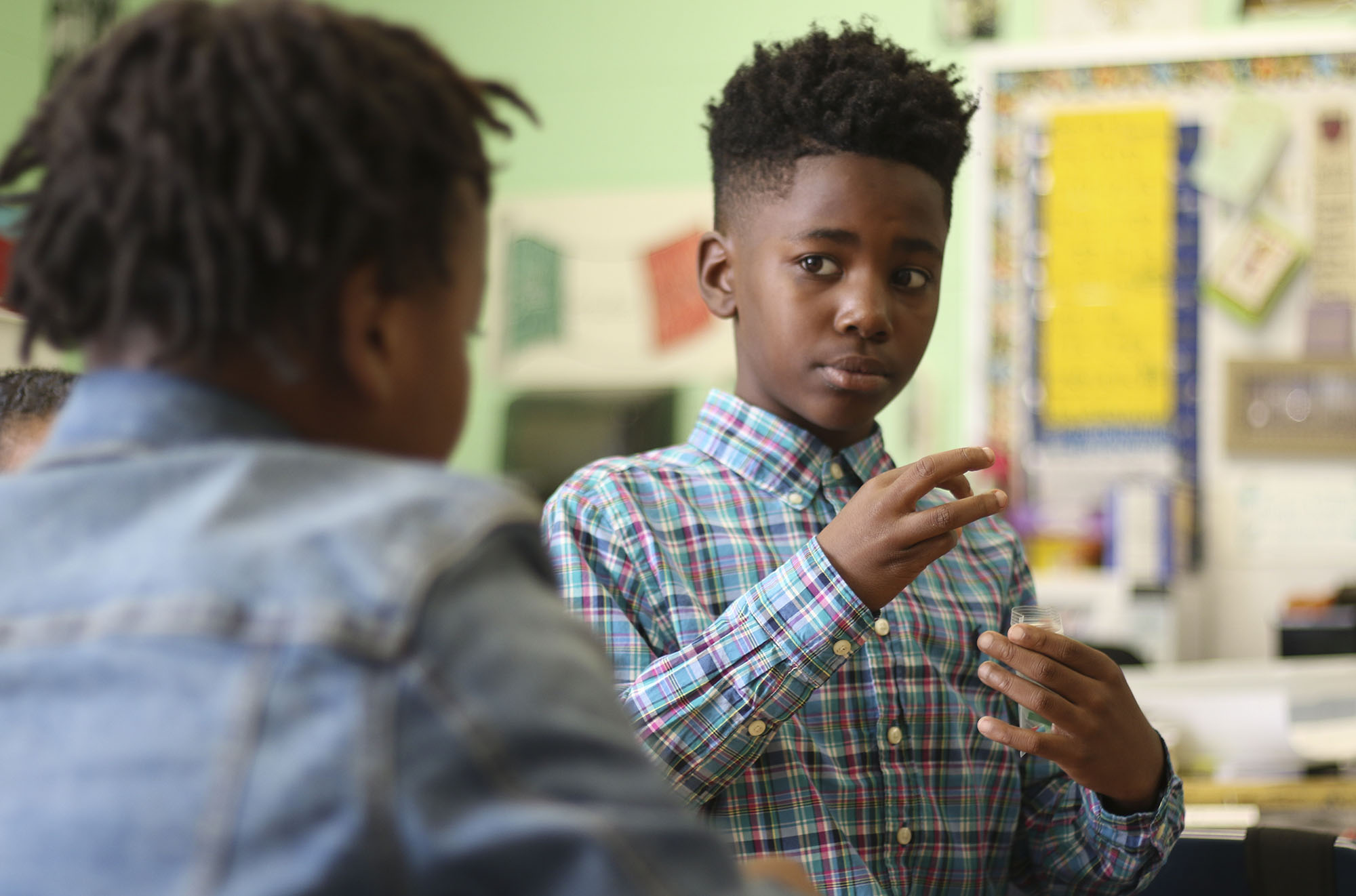 Staff Photo by Dan Henry / The Chattanooga Times Free Press- 2/21/17. Sh'Quaveon Wells, left, works with La'michael Porter in Susan Dorsa's fourth grade class as they learn about about plant cell structure using the Science Sparks! curriculum which Dorsa helped develop. More than 80 teachers across the district were given nine weeks worth of science lessons and all the supplies they need to make them hands-on. This pilot is one of the ways Hamilton County Schools is working to better engage students and teachers.