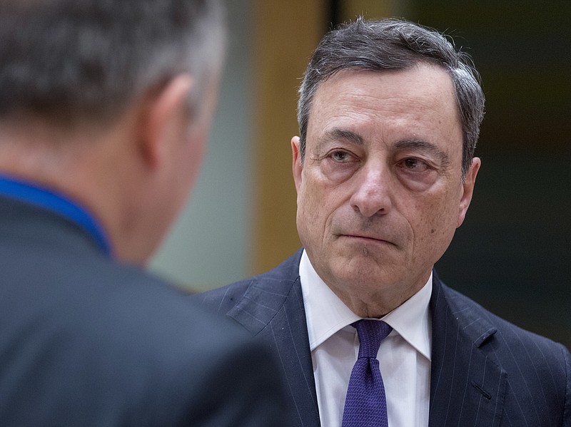 
              President of the European Central Bank Mario Draghi arrives prior to a round table meeting of Eurogroup finance ministers at the EU Council building in Brussels on Monday, Feb. 20, 2017. The eurozone's 19 finance ministers will be looking to defuse the risk of another Greek crisis as they try to agree Monday on what reforms Greece must still take to qualify for more loans. (AP Photo/Thierry Monasse)
            