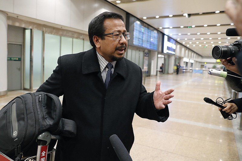 
              Malaysian Ambassador to North Korea Mohamad Nizan Mohamad speaks to journalists as he arrives at the Beijing Capital International Airport in Beijing, China, from Pyongyang after being recalled by Malaysian government, Tuesday, Feb. 21, 2017. Mohamad says at the airport while in transit to Malaysia the investigation into the death of the exiled half-brother of North Korea's ruler at Kuala Lumpur's international airport in Malaysia is being conducted in an impartial manner. Kim appeared to have been poisoned at Kuala Lumpur’s airport last week. (AP Photo/Andy Wong)
            