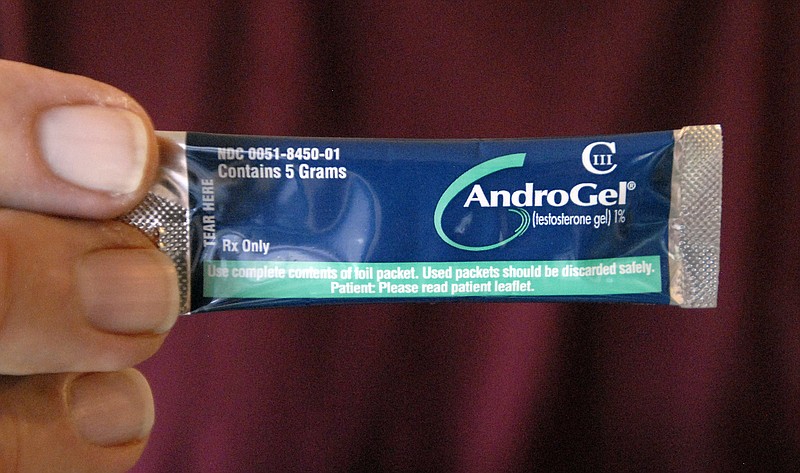 
              FILE - This Sept. 11 2009 file photo shows a packet of AndroGel testosterone in Hygiene, Colo. Testosterone treatment didn't improve older men's memories or mental function in the latest results from landmark government-funded research. Study men used AbbVie's AndroGel in a pump dispenser or placebo gel daily for a year. Some benefits were seen for bone growth and treating anemia but doctors say long-term research is needed to identify potential harms.(Richard M. Hackett /The Daily Times Call via AP, File)
            