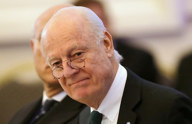 
              FILE -- In this Jan. 23, 2017 file photo, U.N. Special Envoy for Syria Staffan de Mistura arrives to attend the talks on Syrian peace in Astana, Kazakhstan. Chief of staff to de Mistura, Michael Contet,  said Tuesday, Feb. 21, 2017, that their "main guidance" for the first intra-Syrian peace talks in 10 months will be a Security Council resolution that calls for political transition. Contet said that de Mistura is putting the "finishing touches on arrangements" for Thursday's start of talks in Geneva between government and opposition delegations, the fourth round since early last year. (AP Photo/Sergei Grits, File)
            