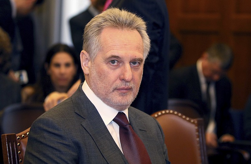 
              Ukrainian oligarch Dymitro Firtash waits for the start of his trial at the courts of justice in Vienna, Austria, Tuesday, Feb. 21, 2017. Firtash was arrested in Vienna in March 2014 on an American warrant charging him with bribery and other offenses. (AP Photo/Ronald Zak)
            