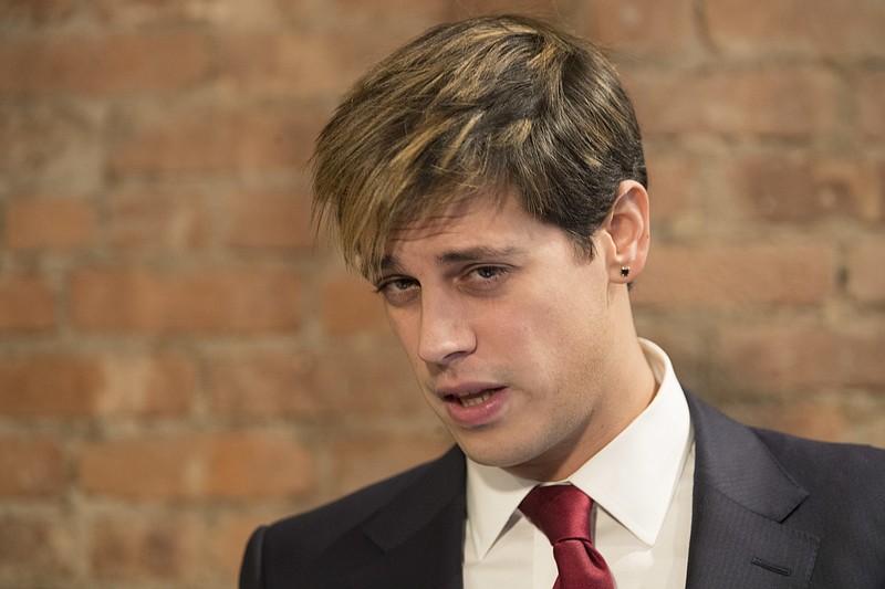 
              Milo Yiannopoulos speaks during a news conference, Tuesday, Feb. 21, 2017, in New York.  Yiannopoulos has resigned as editor of Breitbart Tech after coming under fire from other conservatives over comments on sexual relationships between boys and older men.  (AP Photo/Mary Altaffer)
            