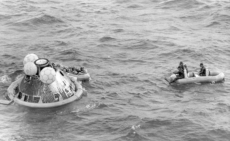 
              FILE - In this July 24, 1969 file photo, the Apollo 11 command module lands in the Pacific Ocean and the crew waits to be picked up by U.S. Navy personnel after an eight day mission to the moon. The Apollo 11 command module, which travelled more than 950,000 miles to take Americans to the moon and back in 1969, is going on a road trip, leaving the Smithsonian for the first time in more than four decades. (AP Photo, File)
            