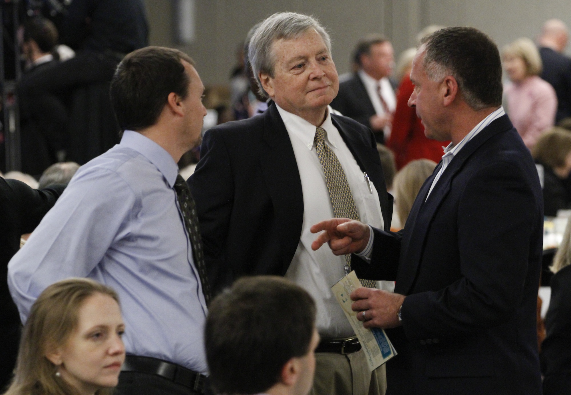 Staff Photo by Dan Henry/Chattanooga Times Free Press - 2/13/13. Neil Brunetz, Alfred Smith and Mike Mallen, from left, converse before the start of Siskin Hospital's 10th Anniversary Possibilities Luncheon at the Chattanooga Convention Center on Wednesday.
