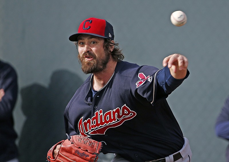 
              FILE - In this Tuesday, Feb. 14, 2017, file photo, Cleveland Indians pitcher Andrew Miller throws a pitch at the Indians baseball spring training facility in Goodyear, Ariz. The left-hander, who makes his living fooling hitters and whose ability to pitch extended innings in October carried Cleveland to within one victory of a World Series title last season, will leave spring training March 2017 to play for Team USA in the World Baseball Classic. (AP Photo/Ross D. Franklin, File)
            