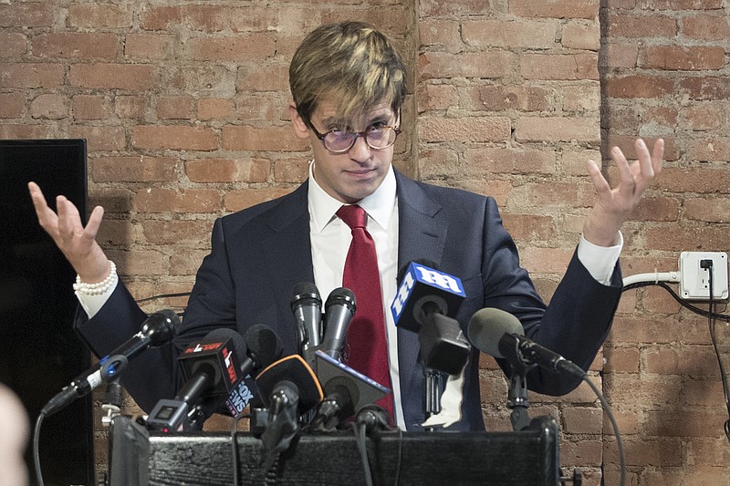 
              Milo Yiannopoulos speaks during a news conference, Tuesday, Feb. 21, 2017, in New York.  Yiannopoulos has resigned as editor of Breitbart Tech after coming under fire from other conservatives over comments on sexual relationships between boys and older men. (AP Photo/Mary Altaffer)
            