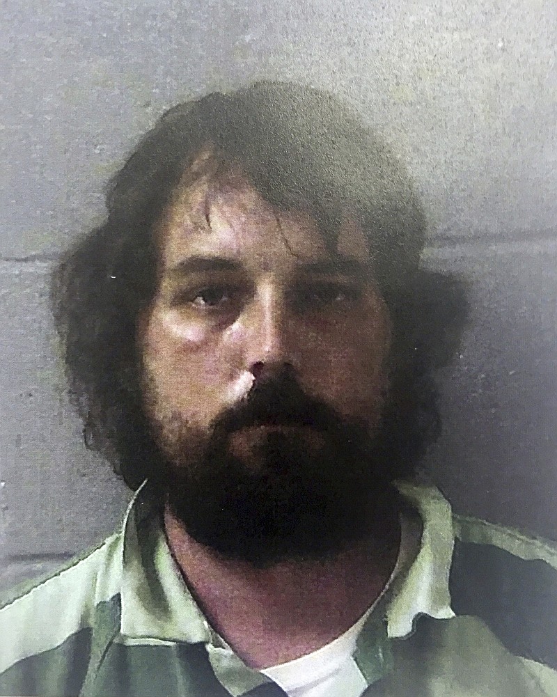 
              This Feb 22, 2017 photo released by the Georgia Bureau of Investigation shows Ryan Alexander Duke, in Georgia. Duke was arrested by authorities on murder charges in the disappearance of a high school teacher in rural south Georgia more than 11 years ago.   (Georgia Bureau of Investigation via AP)
            