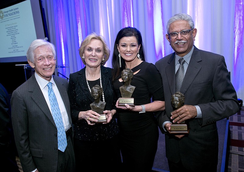 The dinner's honorees, from left, are Olan and Norma Mills, Dr. Nita Shumaker and Dr. Manoo Bhakta.