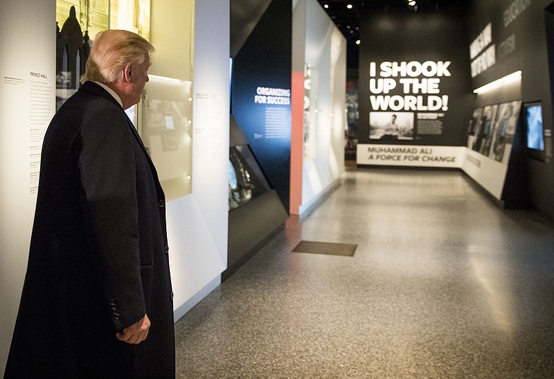 President Donald Trump tours the National Museum of African American History and Culture in Washington, Tuesday. While delivering remarks at the museum, Trump said anti-Semitism is "horrible," and "painful," speaking out for the first time about a rising tide of incidents and threats targeting Jewish people and institutions since he was inaugurated. (Doug Mills/The New York Times)