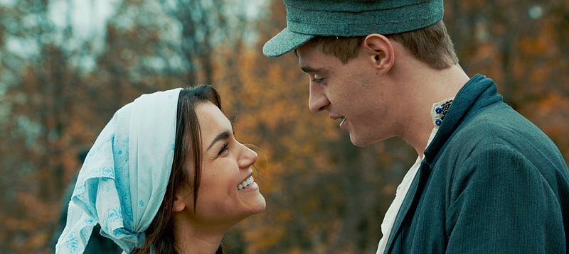 
              This image released by Roadside Attractions shows Samantha Barks, left, and Max Irons in a scene from, "Bitter Harvest." (Roadside Attractions via AP)
            
