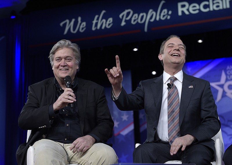 
              White House Chief of Staff Reince Priebus, right, accompanied by White House strategist Stephen Bannon, speaks at the Conservative Political Action Conference (CPAC) in Oxon Hill, Md., Thursday, Feb. 23, 2017. (AP Photo/Susan Walsh)
            