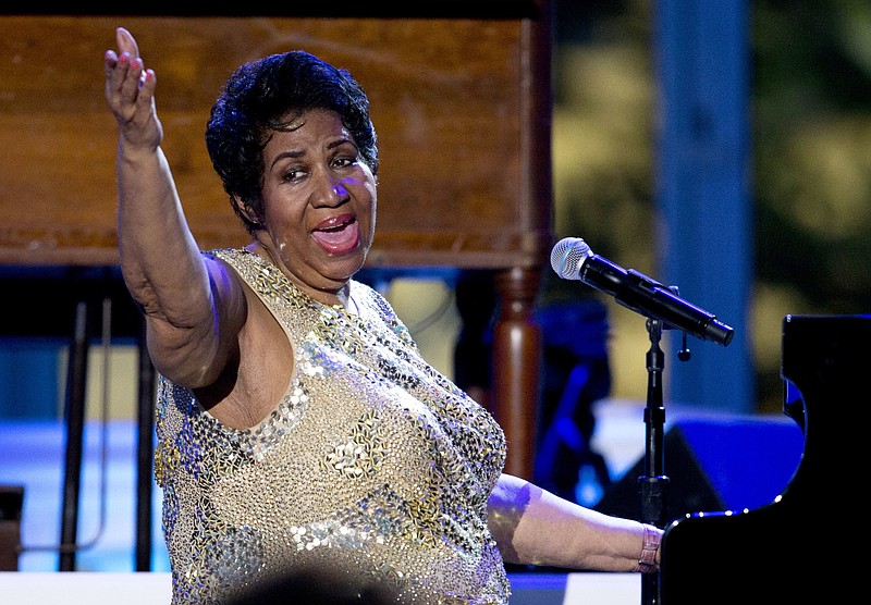 
              FILE - In this April 29, 2016 file photo, Aretha Franklin performs at the International Jazz Day Concert on the South Lawn of the White House of the Washington. Officials in charge of fixing up Franklin's childhood home in Memphis, Tenn., say they are working with the DIY Network to move the crumbling structure to a safer location and make it more attractive for visitors.  A judge had ordered it demolished, but he put that order on hold after preservationists stabilized the house. (AP Photo/Carolyn Kaster, File)
            