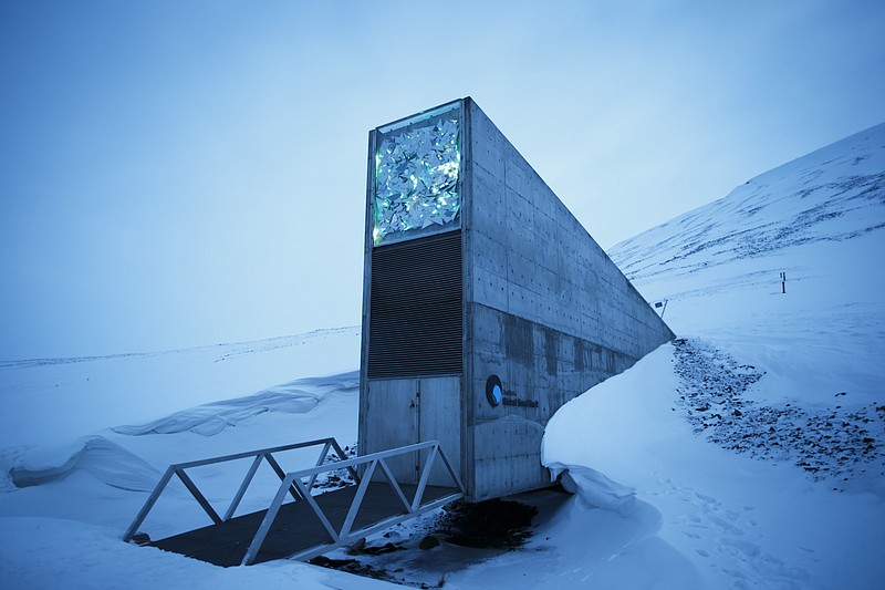 
              FILE - This is a March 2. 2016  file photo of an exterior view of the Svalbard Global Seed Vault, the secure seed bank on Svalbard, Norway. Nearly 10 years after a "doomsday" seed vault opened on an Arctic island off Norway, some 50,000 new samples from seed collections ranging from India, the Middle East, northern Africa and Europe to the U.S. and Mexico, have been deposited in the world’s largest repository, built to safeguard against wars or natural disasters wiping out global food crops. (Heiko Junge/ NTB scanpix, File  via AP)
            