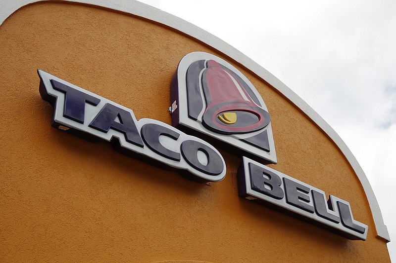 
              FILE - This Friday, May 23, 2014, file photo, shows the sign at a Taco Bell in Mount Lebanon, Pa. Taco Bell spokesman Rob Poetsch said Feb. 23, 2017, that theits Naked Chicken Chalupa, a sandwhich with a shell made out of fried chicken, will be pulled from menus as it was always intended to be a limited time offer. (AP Photo/Gene J. Puskar, File)
            