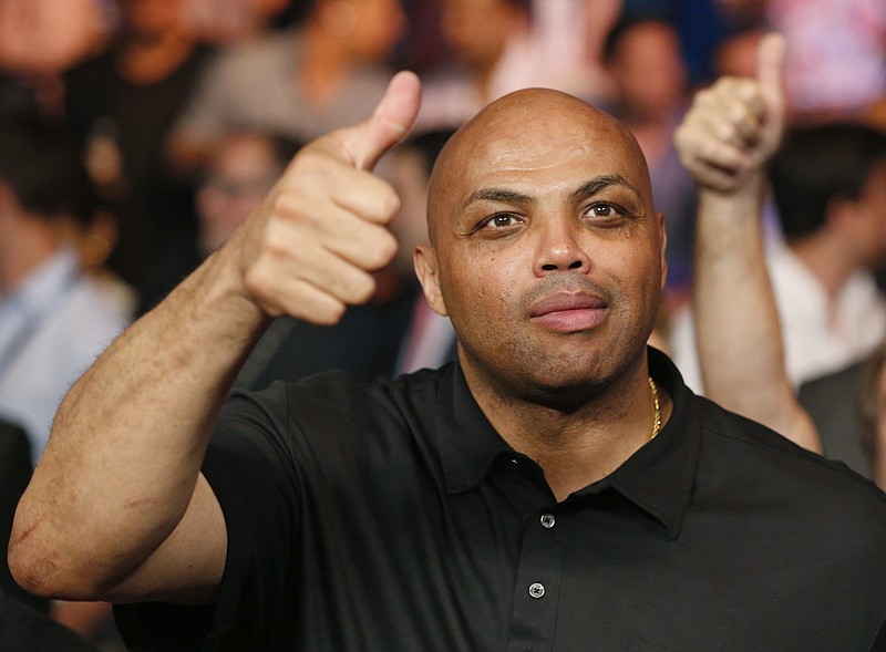 
              FILE - In this May 2, 2015, file photo, Charles Barkley joins the crowd before the start of the world welterweight championship bout between Floyd Mayweather Jr., and Manny Pacquiao in Las Vegas. Barkley accidentally dropped a four-letter word on-air on TNT's "Inside the NBA" on Feb. 23, 2017. (AP Photo/John Locher, File)
            