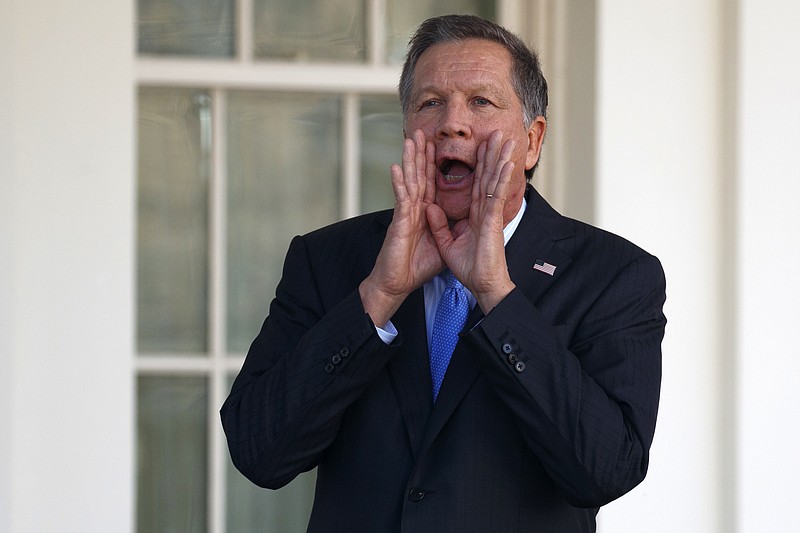 
              Ohio Gov. John Kasich responds to reporters as he arrives at the White House in Washington, Friday, Feb. 24, 2017, for a meeting with President Donald Trump. (AP Photo/Evan Vucci)
            