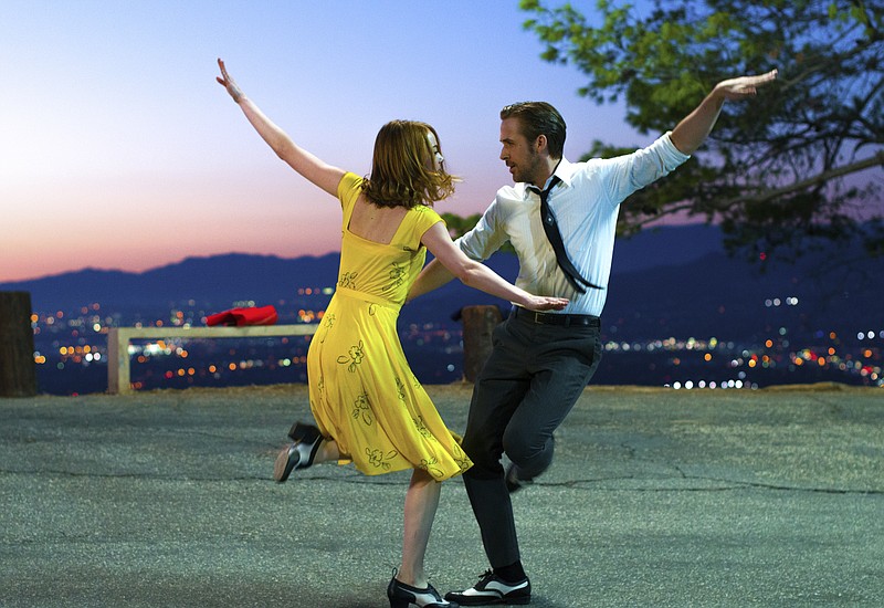 This image released by Lionsgate shows Ryan Gosling, right, and Emma Stone in a scene from, "La La Land." The film was nominated for an Oscar for best feature film. The 89th Academy Awards will take place on Feb. 26. (Dale Robinette/Lionsgate via AP, File)