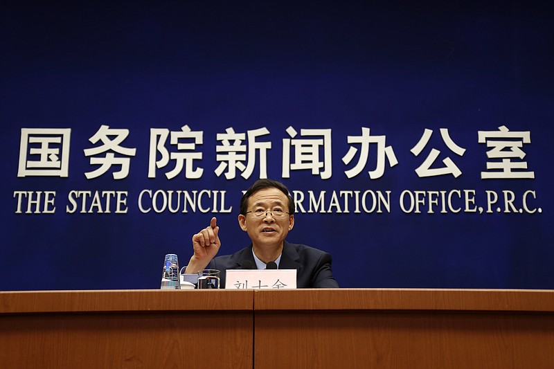 
              China Securities Regulatory Commission Chairman Liu Shiyu gestures as he speaks during a press briefing on the reform, stability and development of the Chinese capital market, at the State Council Information Office in Beijing, Sunday, Feb. 26, 2017. (AP Photo/Andy Wong)
            