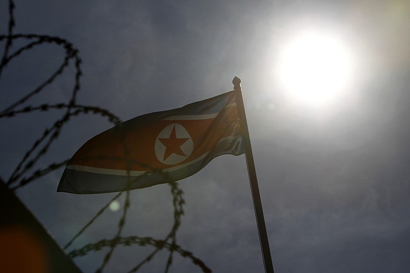 
              A North Korean flag waves at North Korean Embassy in Kuala Lumpur, Malaysia, Saturday, Feb. 25, 2017. According to police Friday, forensics stated that the banned chemical weapon VX nerve agent was used to kill Kim Jong Nam, the North Korean ruler's outcast half brother who was poisoned last week at the airport. (AP Photo/Daniel Chan)
            