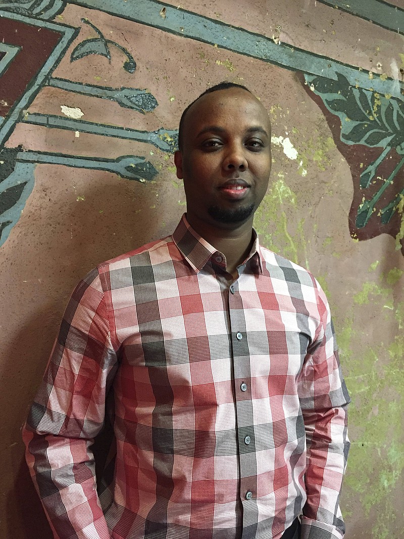 
              In this Feb. 14, 2017 photo, Mohamed Farah poses at his office in Minneapolis. Farah is executive director of Ka Joog, a group that works to engage Somali youth in Minnesota. The group rejected $500,000 in federal funding earlier this month, saying the actions and statements of President Donald Trump are anti-Muslim and anti-immigrant. (AP Photo/Amy Forliti)
            