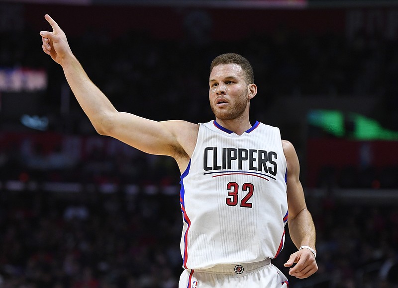 
              Los Angeles Clippers forward Blake Griffin gestures after hitting a three-point shot during the first half of an NBA basketball game against the Charlotte Hornets, Sunday, Feb. 26, 2017, in Los Angeles. (AP Photo/Mark J. Terrill)
            