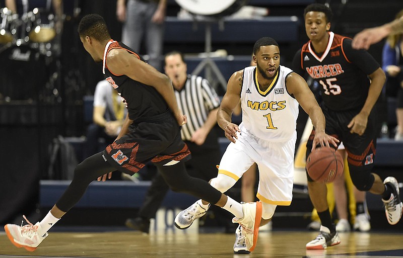 UTC senior Greg Pryor dribbles through traffic during Saturday's 64-54 loss to Mercer. The Mocs close the regular season tonight at The Citadel, and the SoCon tournament starts Saturday in Asheville, N.C.