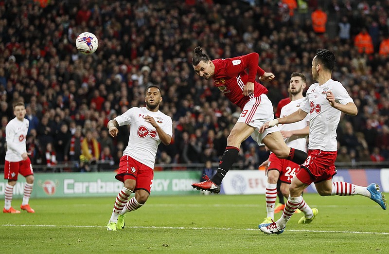 
              United's Zlatan Ibrahimovic scores his side's third goal during the English League Cup final soccer match between Manchester United and Southampton FC at Wembley stadium in London, Sunday, Feb. 26, 2017. (AP Photo/Kirsty Wigglesworth)
            