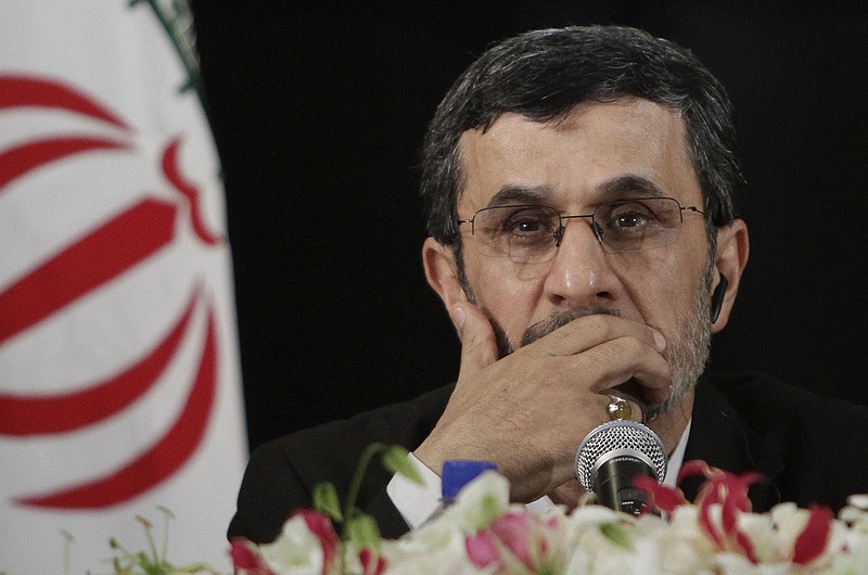 
              FILE- In this Wednesday, Sept. 26, 2012 file photo, President of Iran, Mahmoud Ahmadinejad listens during a news conference after addressing the 67th session of the United Nations General Assembly on Wednesday, Sept. 26, 2012 in New York. Iran's former hard-line President Mahmoud Ahmadinejad has sent a letter to U.S. President Donald Trump, discussing immigration, America's wars in the Middle East and other topics. (AP Photo/Bebeto Matthews, File)
            