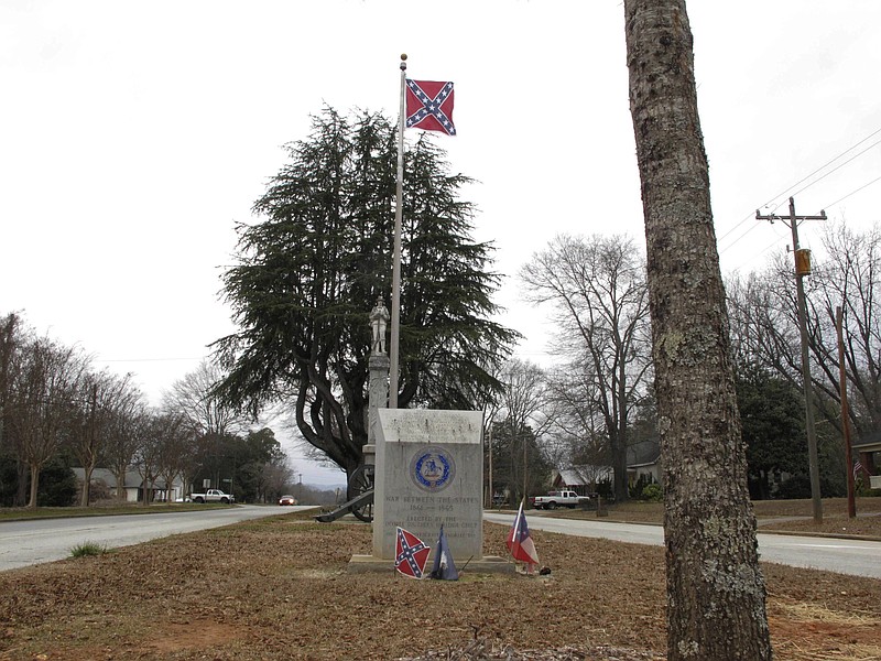 
              The Confederate monument in Walhalla, South Carolina, is seen on Tuesday, Feb. 7, 2017. The Confederate flag was returned to the monument after the South Carolina Secessionist Party said changing the flag broke state law. (AP Photo/Jeffrey Collins)
            