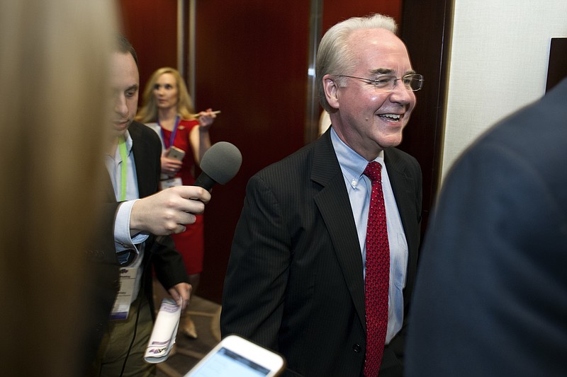 
              Health and Human Services Secretary Tom Price is followed by reporters as he leaves a health care meeting during the National Governors Association Winter Meeting in Washington, Saturday, Feb. 25, 2017. (AP Photo/Cliff Owen)
            
