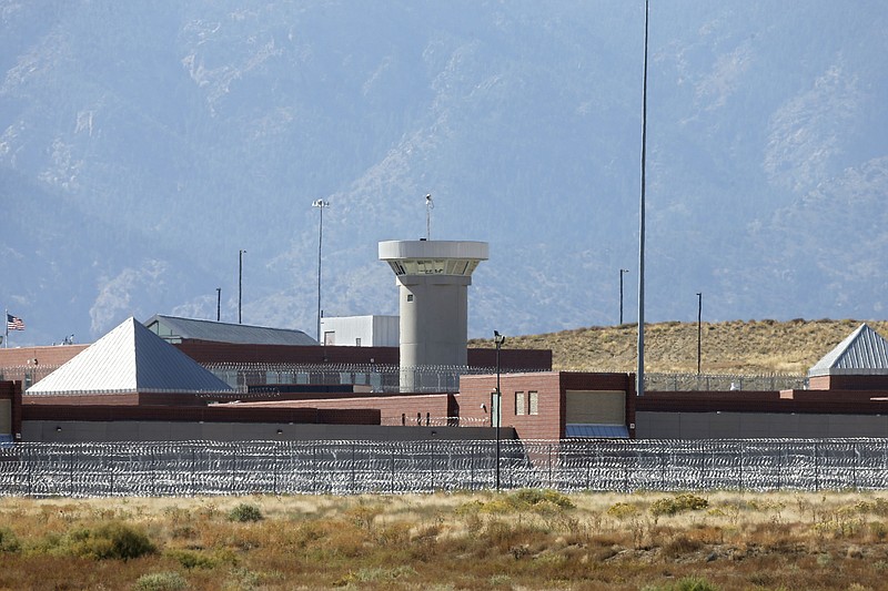 
              FILE - In this Oct. 15, 2015 file photo, a guard tower looms over a federal prison complex which houses a Supermax facility outside Florence, in southern Colorado. The federal prison population is on the decline, but a new attorney general who talks tough on drugs and crime could usher in a reversal of that trend. The resources of a prison system that for years has grappled with overcrowding, but that experienced a population drop as Justice Department leaders pushed a different approach to drug prosecutions, could again be taxed.  (AP Photo/Brennan Linsley,File)
            