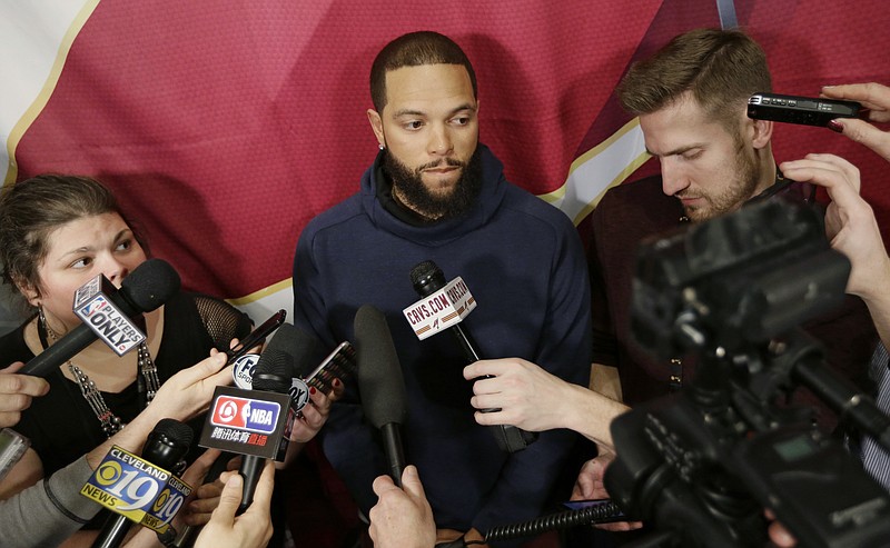
              Cleveland Cavaliers' Deron Williams talks with the media before an NBA basketball game between the Milwaukee Bucks and the Cavaliers, Monday, Feb. 27, 2017, in Cleveland. Williams, an Olympian and three-time All-Star who has never made it to the NBA Finals, signed as a free agent on Monday with the Cavs, giving the defending champions the backup point guard they've coveted and another playmaker to help them defend their title. (AP Photo/Tony Dejak)
            