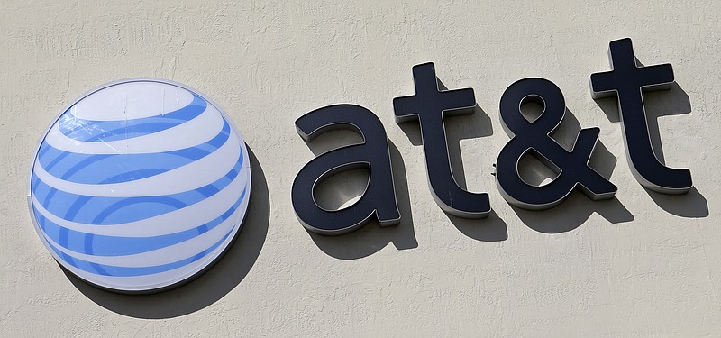 
              FILE - This Wednesday, Feb. 8, 2017, file photo shows the AT&T sign at a store in Hialeah, Fla. AT&T’s $85 billion purchase of Time Warner may be getting an easier path to approval after the chief telecommunications regulator says it isn’t likely to review the deal. (AP Photo/Alan Diaz, File)
            