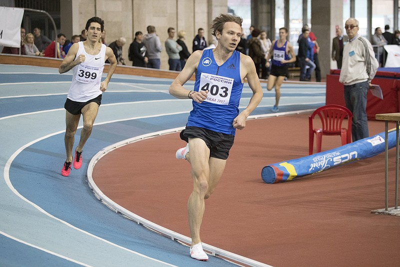 
              In this photo taken on Tuesday, Feb. 21, 2017, Russian runner and participant of he Rocket Science Project Vasily Permitin, center, competes in the Russian Indoor Championships in Moscow, Russia. An upstart group of Russian track and field athletes want to beat dopers with science and start showing their country can win clean. Formed in reaction to Russia’s doping scandals, the Rocket Science Project is hoping to encourage whistleblowers and create an independent training camp with a strict no-drugs policy. (AP Photo/Pavel Golovkin)
            