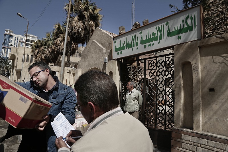 
              A truck loaded with goods arrives for Christian families who fled el-Arish at the Evangelical Church in Ismailia, 120 kilometers (75 miles) east of Cairo, Egypt, Sunday, Feb. 26, 2017. Egyptian Christians fearing attacks by Islamic State militants are fleeing the volatile northern part of the Sinai Peninsula for a fourth day, after a string of sectarian killings there sent hundreds fleeing and raised accusations the government is failing to protect the minority. (AP Photo/Nariman El-Mofty)
            