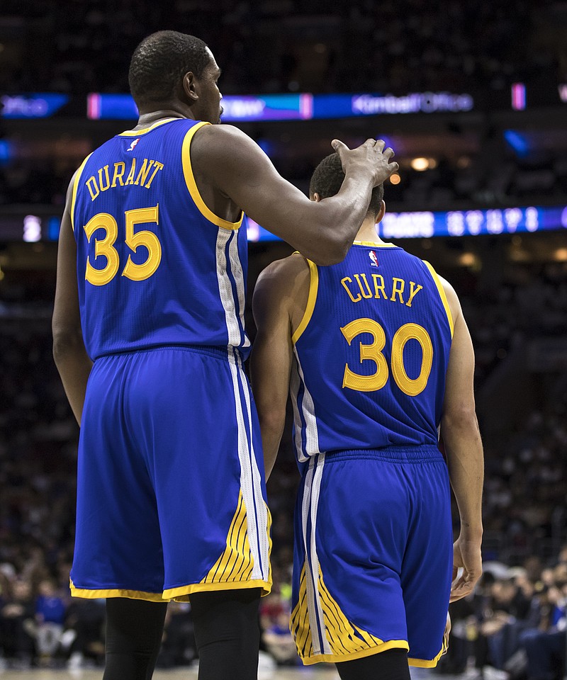 Despite cold Steph Curry, Durant and Warriors beat 76ers 119-108