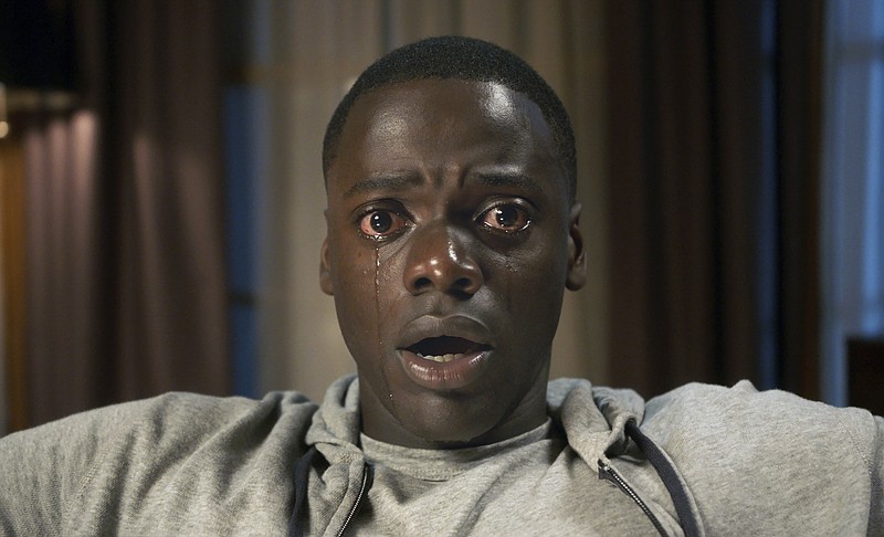 
              This image released by Universal Pictures shows Daniel Kaluuya in a scene from, "Get Out." (Universal Pictures via AP)
            