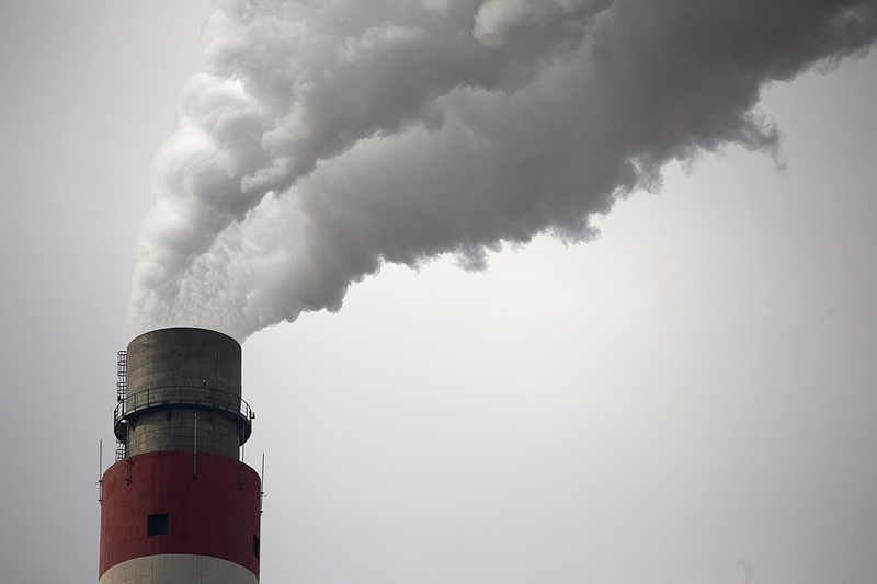 
              FILE - In this Nov. 3, 2015 file photo, smoke and steam rise from the smokestack of a coal-fired power plant near Ordos in northern China's Inner Mongolia Autonomous Region. According to official data released Tuesday, Feb. 28, 2017, China's consumption of coal fell in 2016 for a third year in a row as the world's top polluter has emerged as a leader in efforts to tackle climate change. (AP Photo/Mark Schiefelbein, File)
            