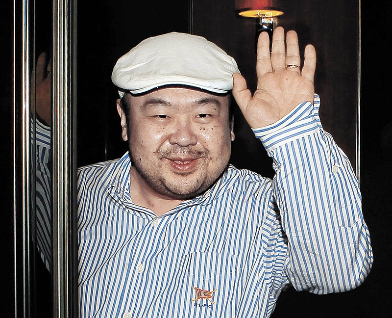 
              FILE - In this June 4, 2010, file photo, dressed in jeans and blue suede loafers, Kim Jong Nam, the eldest son of then North Korean leader Kim Jong Il, waves after his first-ever interview with South Korean media in Macau. Kim Jong Nam had spent years in exile, gambling and drinking and arranging the occasional business deal as he traveled across Asia and Europe. His fortunes had apparently declined in recent years, and he’d moved his family from a luxurious seafront condominium complex in Macau to a more affordable apartment building. (Shin In-seop/JoongAng Ilbo via AP, File)
            