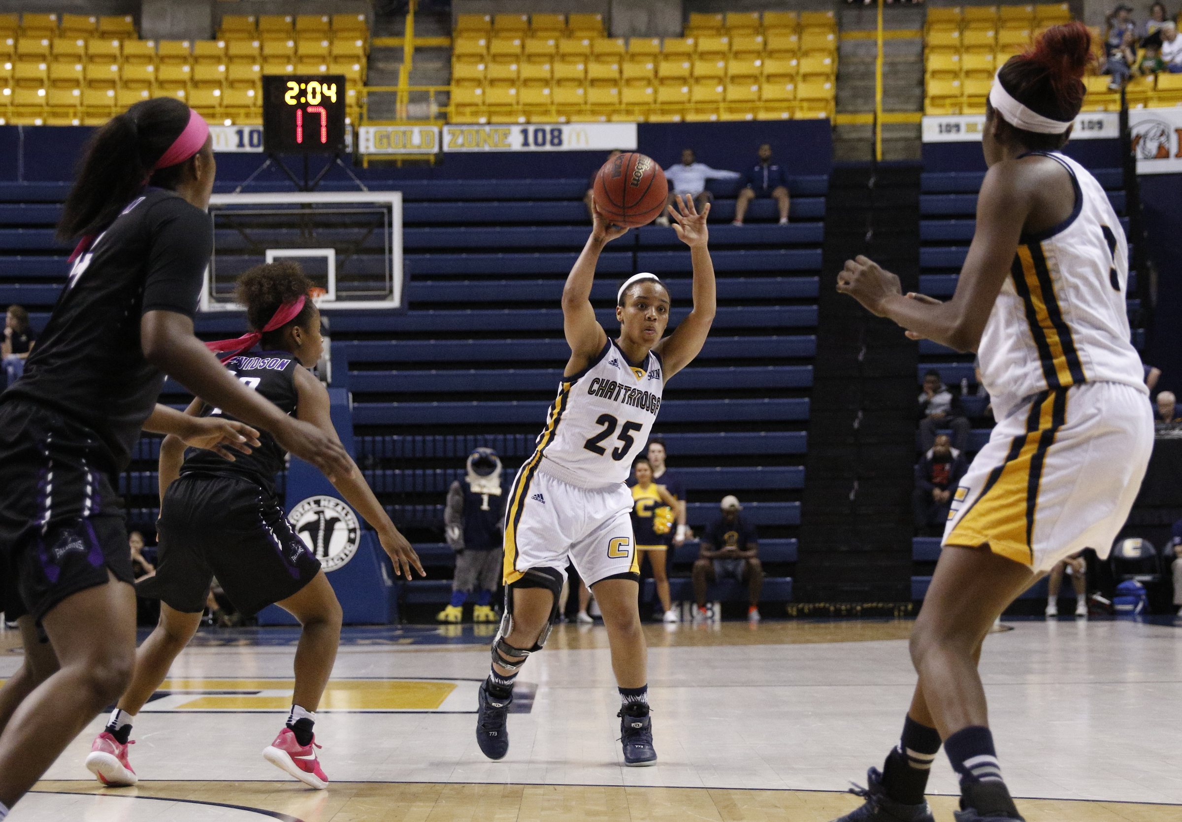 UTC guard Chelsey Shumpert (25) passes to teammate Jasmine Joyner, right, during the Lady Mocs' SoCon basketball game against the Paladins at McKenzie Arena on Thursday, Feb. 23, 2017, in Chattanooga, Tenn.